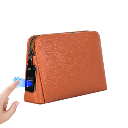 Hermès Orange Fingerprint Lock Leather Clutch
